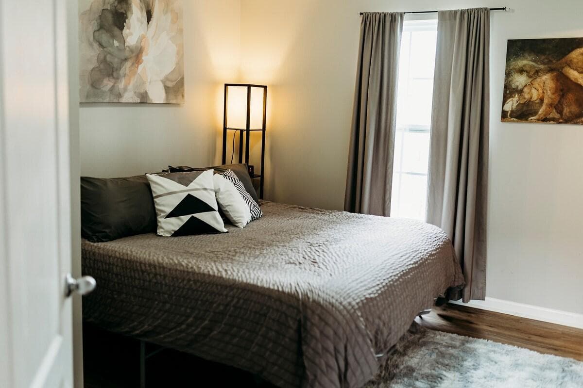 Jumping down to the lower floor, the second suite features a king bed with memory foam mattress.  